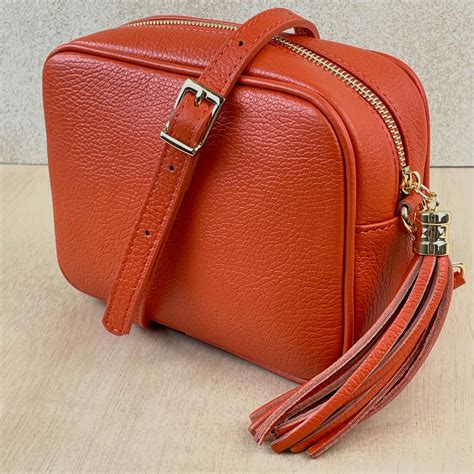 burnt orange purses|orange cross body camera bag.